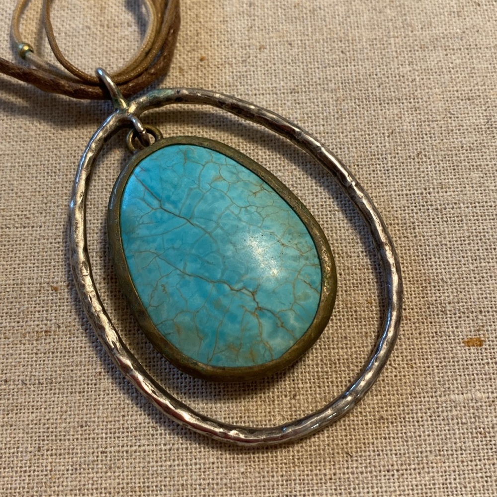 Turquoise and Sterling Silver pendant on 4 strand rope . 16” with 2” extender